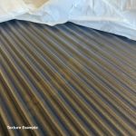 cast iron reeded fireplace chamber lining panels close up of the black texture