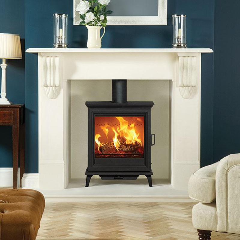 victorian corbel fireplace with log burner