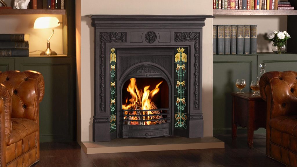 Black cast iron victorian combination fireplace in living room.