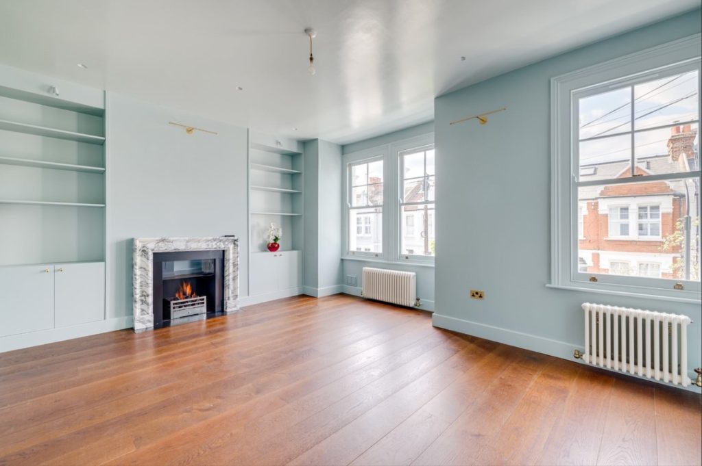 Arabescato marble bolection fireplace with DFE gas fire and Soho fire basket in Fulham London